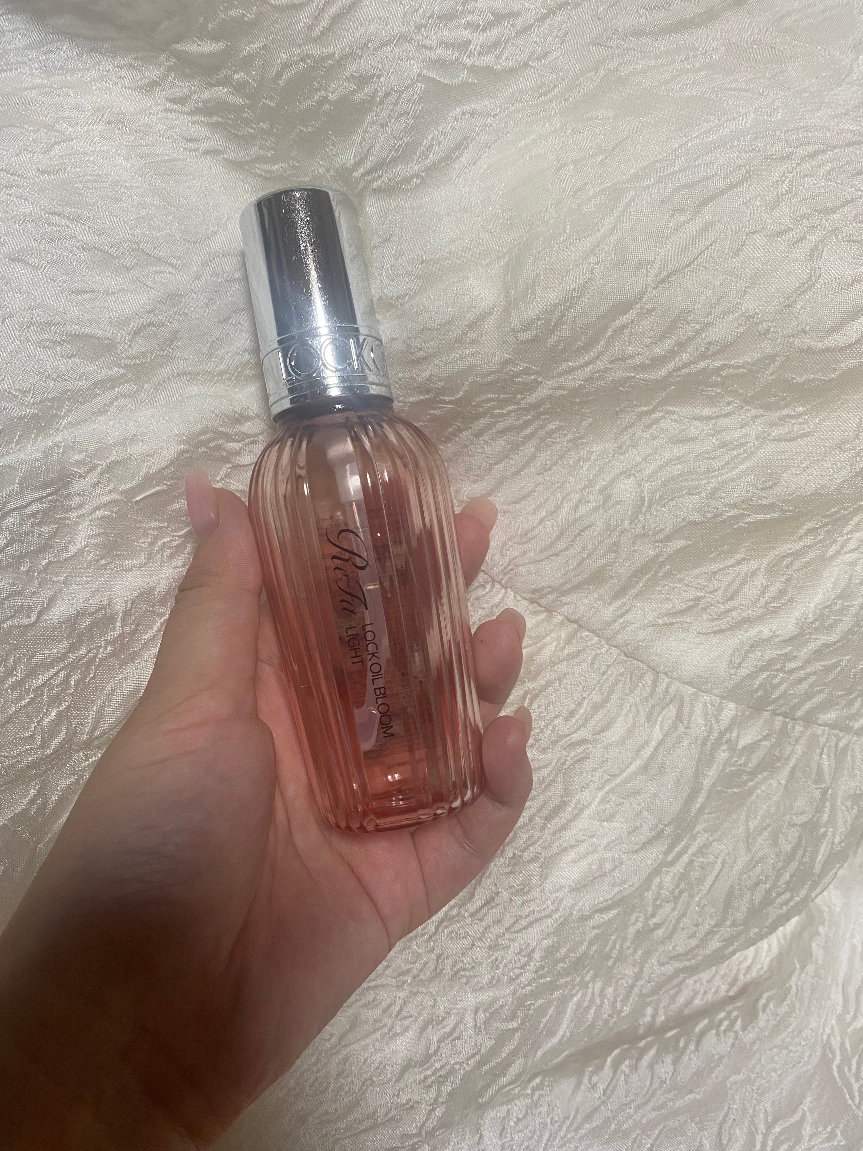 صورة من مراجعة مستخدم لمنتج ReFa زيت الشعر Lock Bloom Light